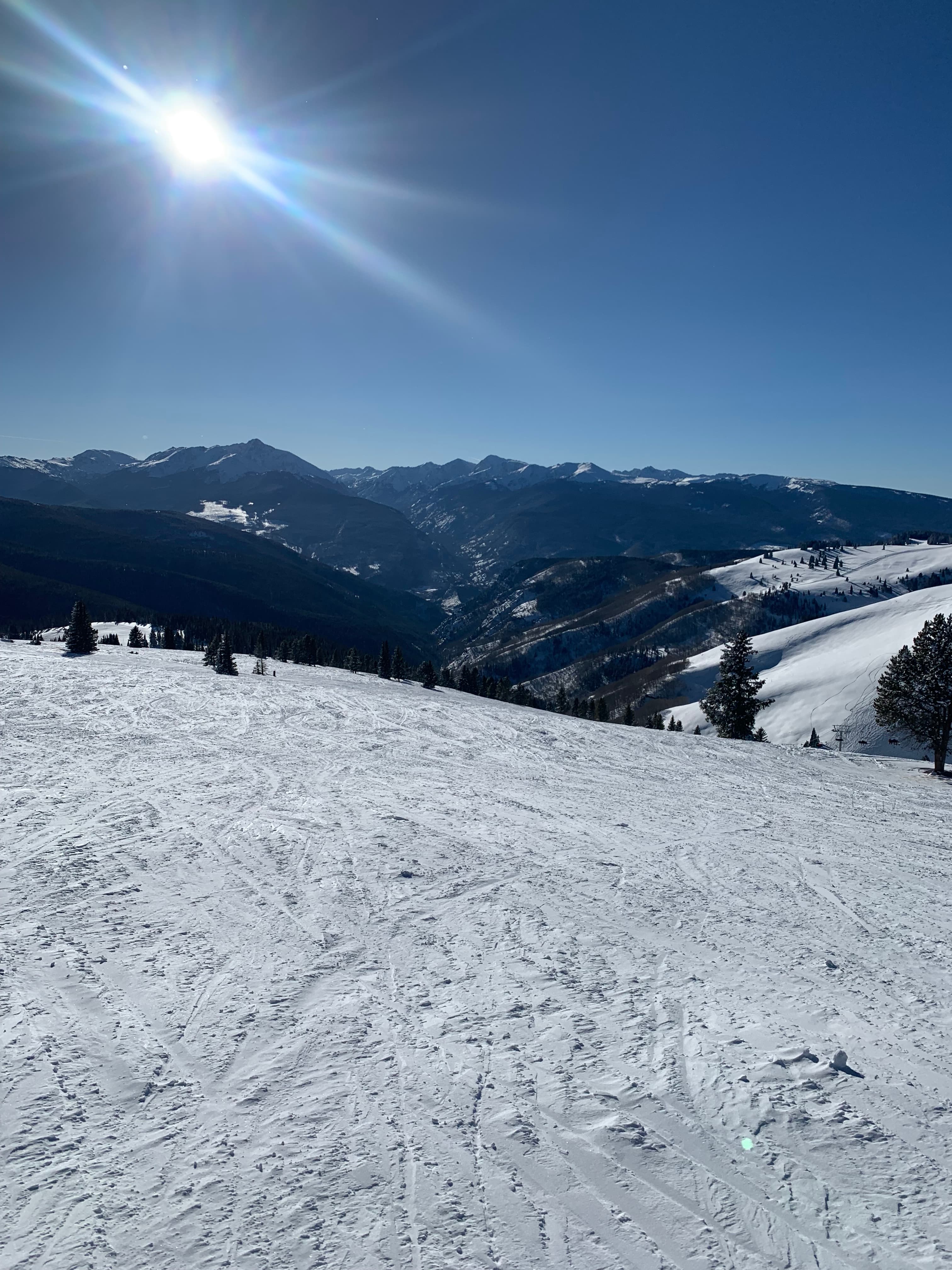 A picture of a mountain from the perspective of a skiier.